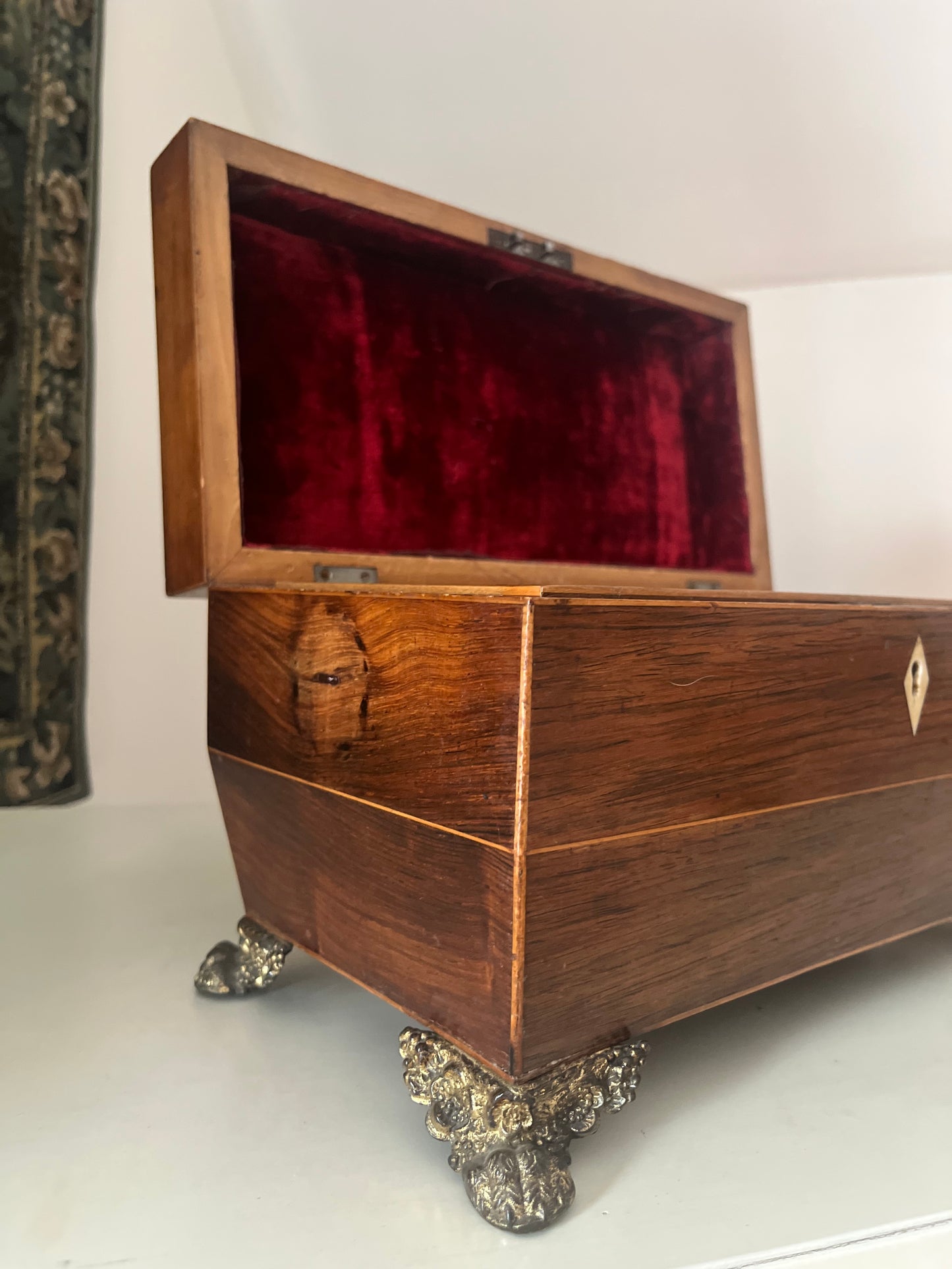 Antique Sarcophagus Shaped Tea Caddy with Lion Paw Feet And Red Velvet Interior.