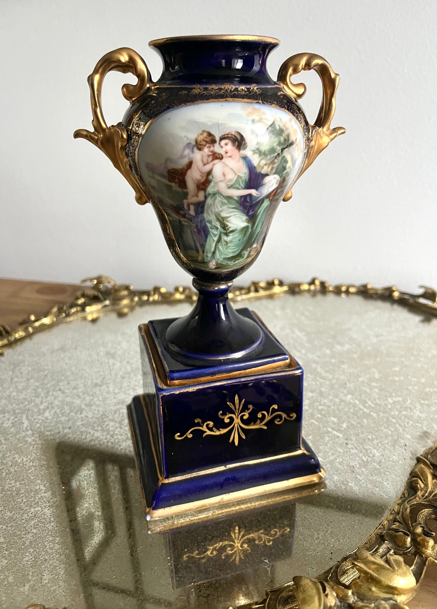 Antique Porcelain hand painted urn by Rudolstadt.