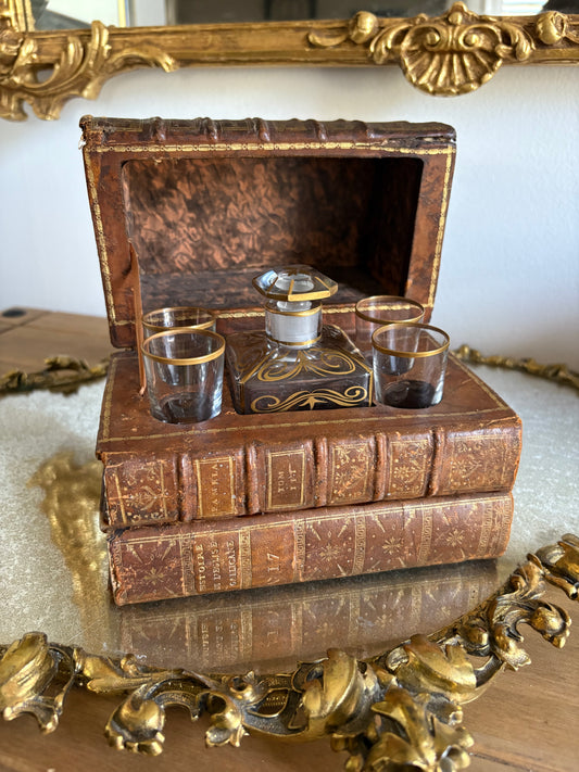 Antique 19th Century French Leather Bound Books Hidden Tantalus Liquor Set with 4 shot glasses.