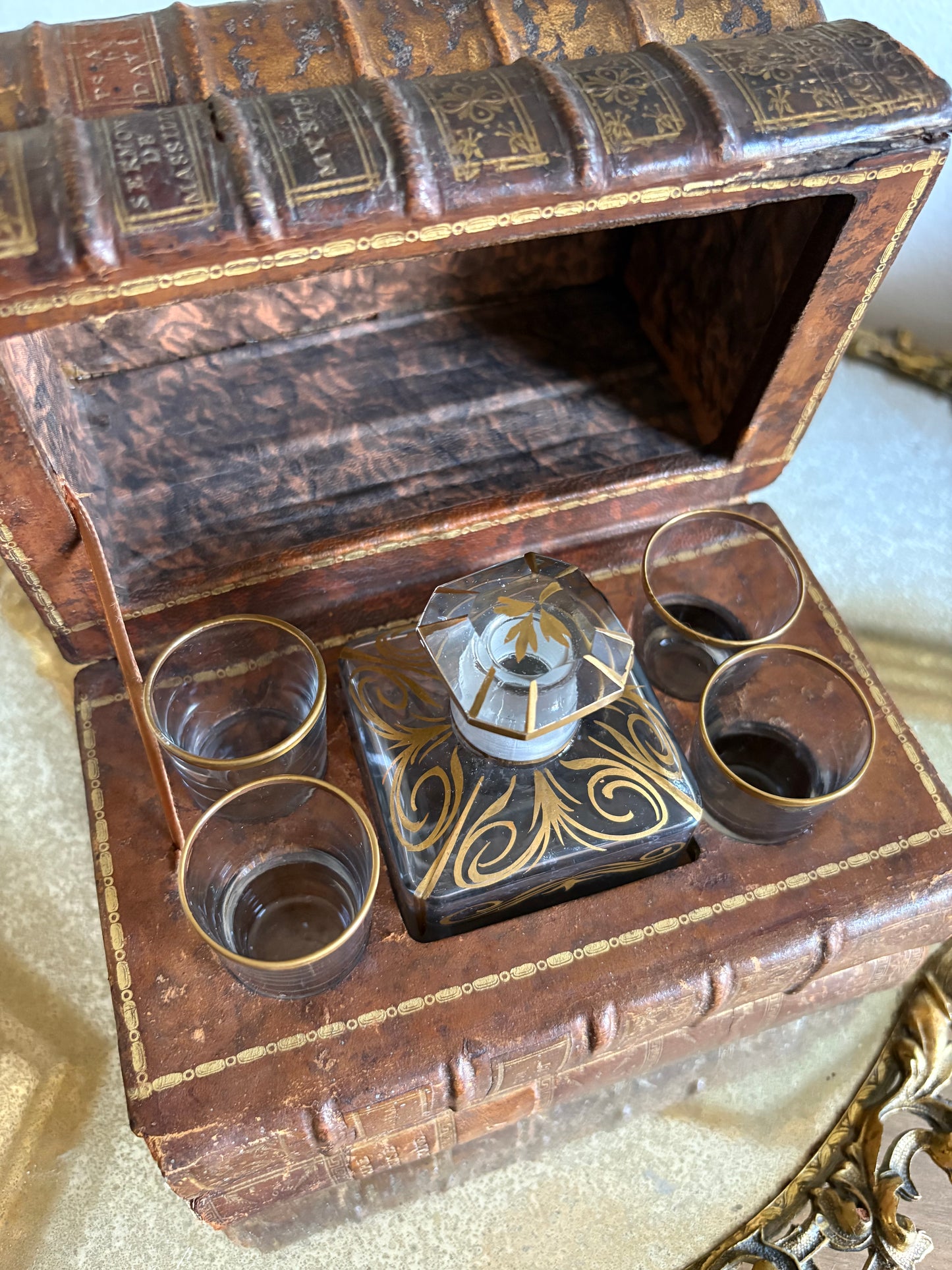 Antique 19th Century French Leather Bound Books Hidden Tantalus Liquor Set with 4 shot glasses.
